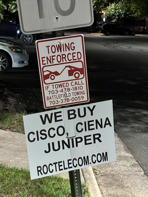 Sign advertising "we buy Cisco, Ciena, Juniper"